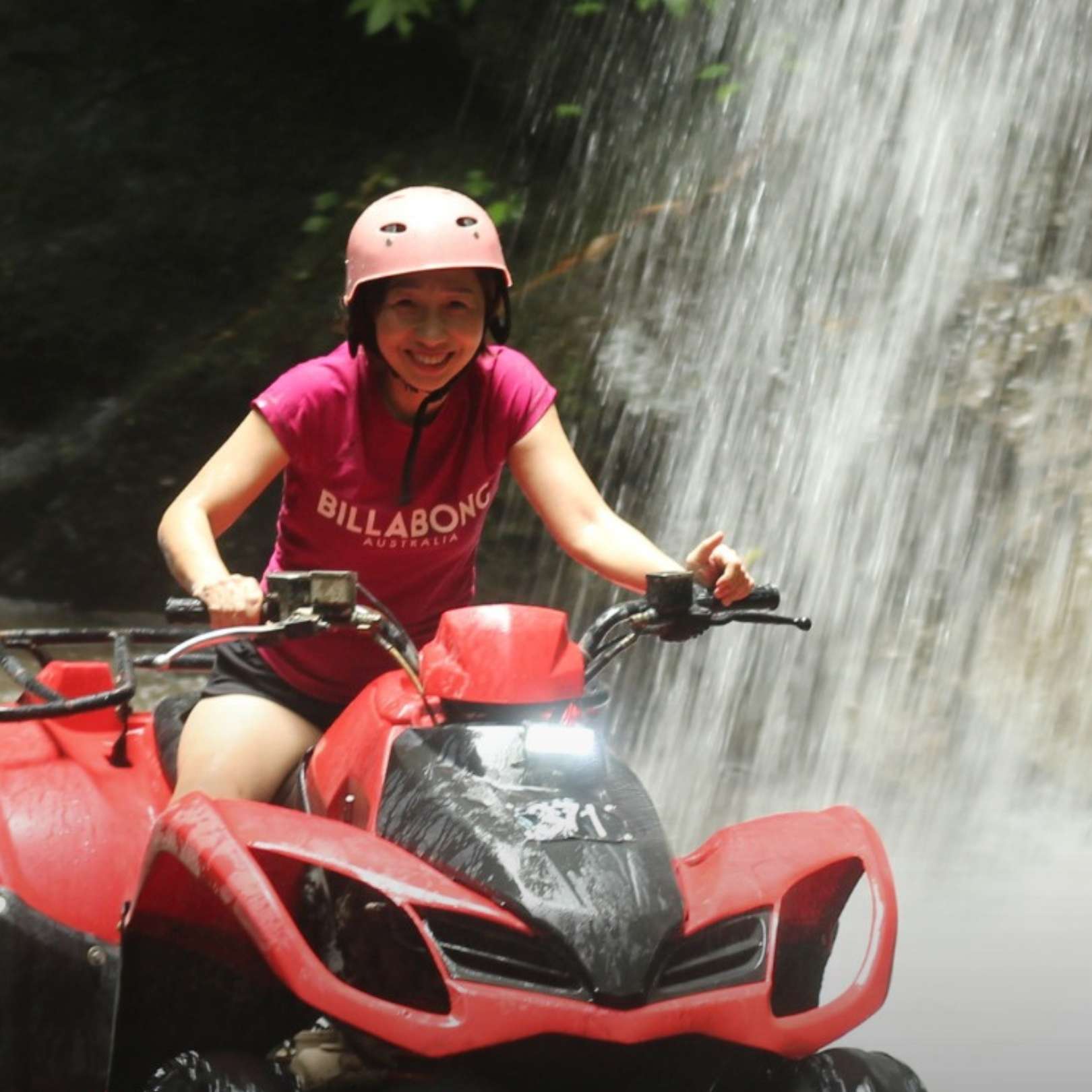 Kuber ATV Quad Bike Through Waterfall And Tunnel