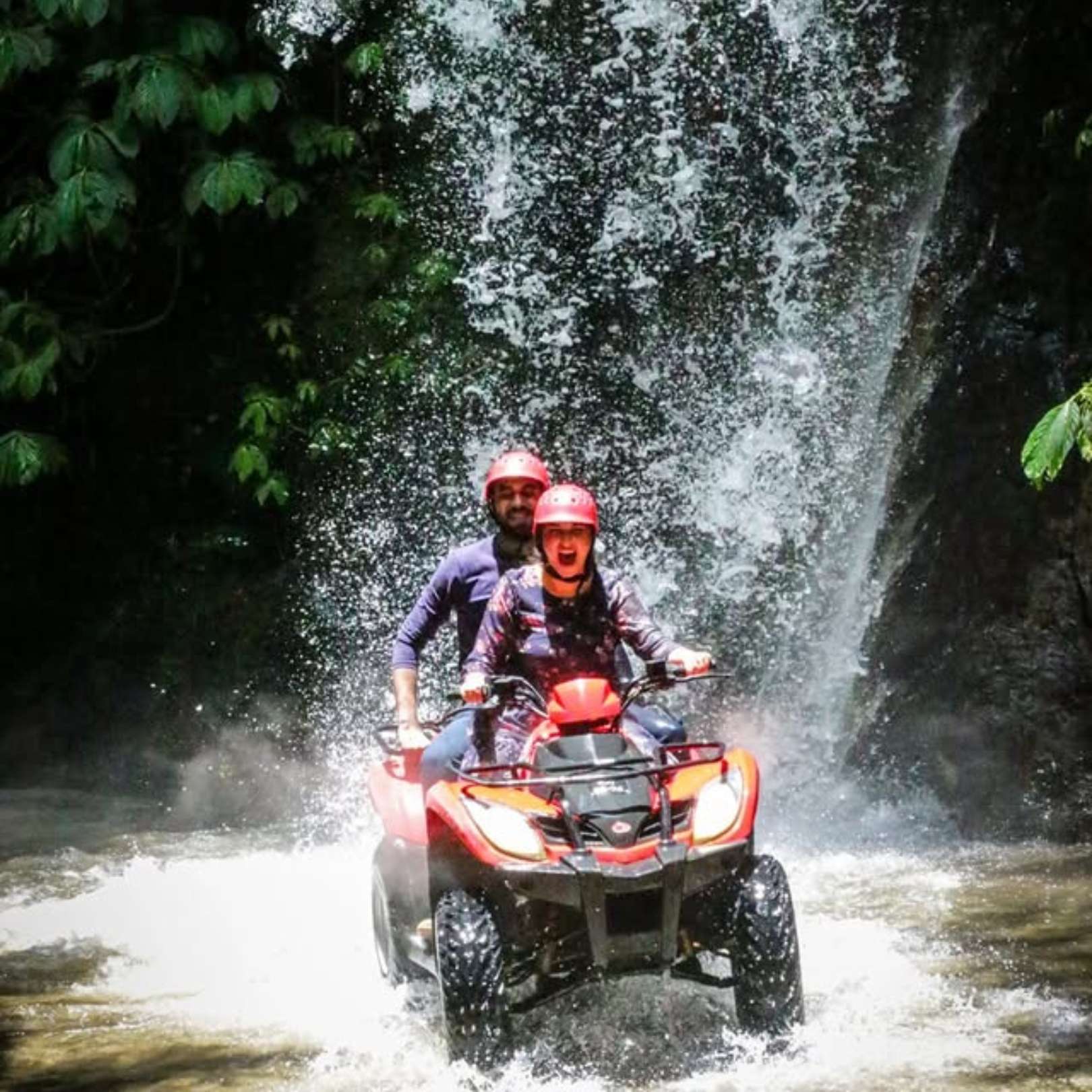 Kuber ATV Quad Bike Through Waterfall And Tunnel