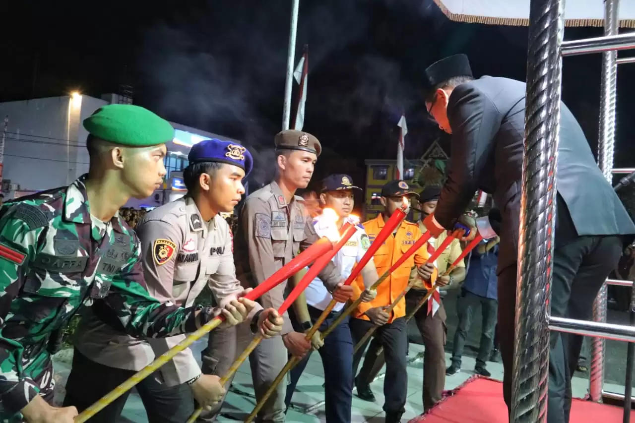 Wabup Rohil Jadi Inspektur Pawai Obor Malam Taptu