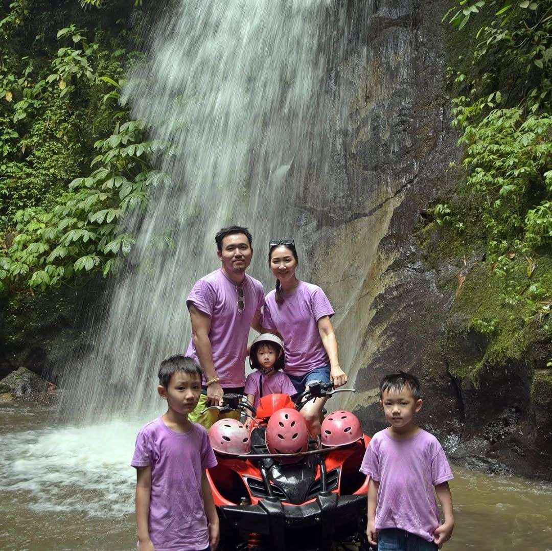 Kuber ATV Quad Bike Through Waterfall and Tunnel