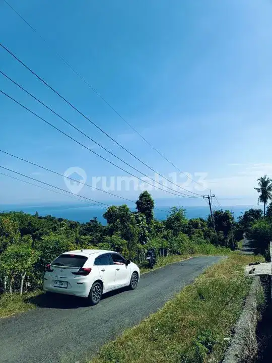 Tanah Perbukitan Lovina View Laut di Pinggir Jalan Aspal Cocok untuk Villa